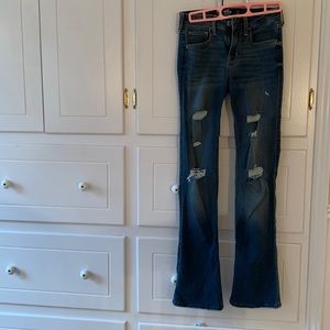 Girls 00short Hollister flare jeans. Medium blue with tears in front. Exc Cond